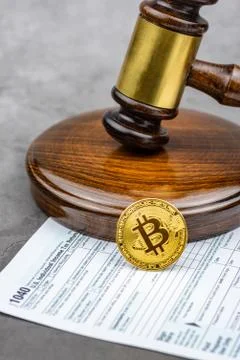 Front view of Bitcoin cryptocurrency physical coin Stock Photos