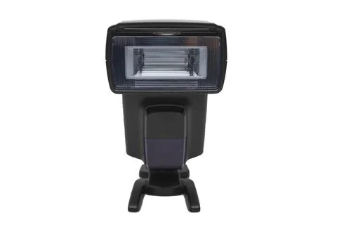 A front view of a black external camera flash speedlight mounted on a hot s.. Fotos de archivo