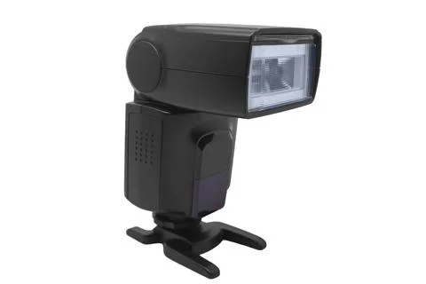 A front view of a black external camera flash speedlight mounted on a hot s.. Stock Photos