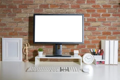 Front view blank desktop computer screen, picture frame and pencil holder o.. Stock Photos