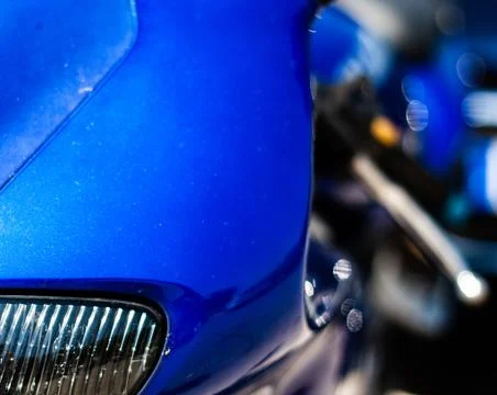 Front view of blue motorcycle Stock Photos