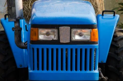 In Front Of View Blue Tractor. Stock Photos