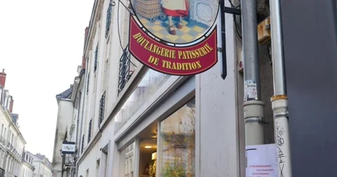 Front view of the Bread and pasty store with logo: boulangerie patisserie in Stock Footage 167945636
