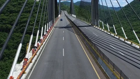 Front view of a bridge on the highway from a drone Stock Footage 93661845
