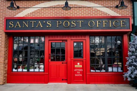 Front View of Bright Red Santa's Post Office Fotos Stock