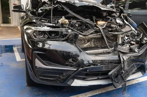 Front view of a broken car after an accident Stock Photos