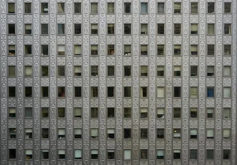 Front view of a building full of windows Stock Photos