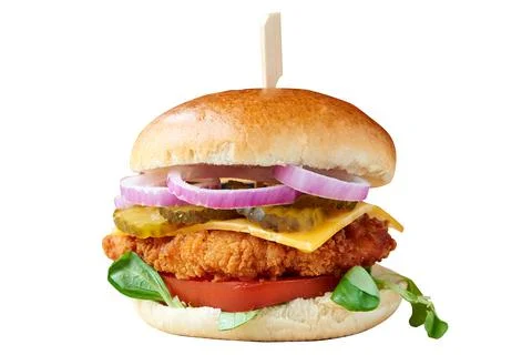 Front view of burger with crispy chicken, onions and cheese Stock Photos