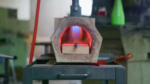 Front View of Burning Forge with Hot Metal – Workshop Background Bokeh Stock Footage 313849833