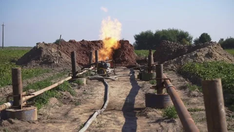 Front view of burning gas in enterprise outdoors. Footage of fire and tubes. Gas Stock Footage 207746829