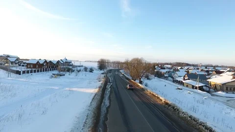 Front view from car mounted camera when vehicle driving winter snowy forest road Video stock 104576543