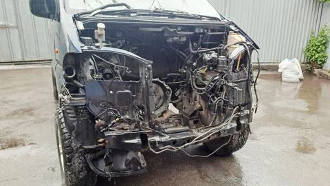 Front view of car with removed engine parts. Fotos Stock