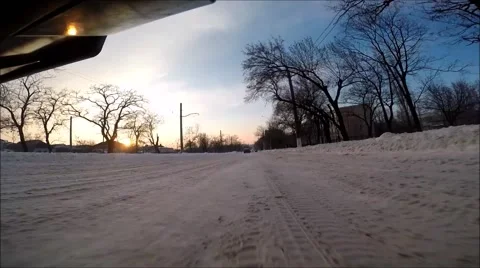 Front view of the car riding on snow covered road Stock Footage 60632846