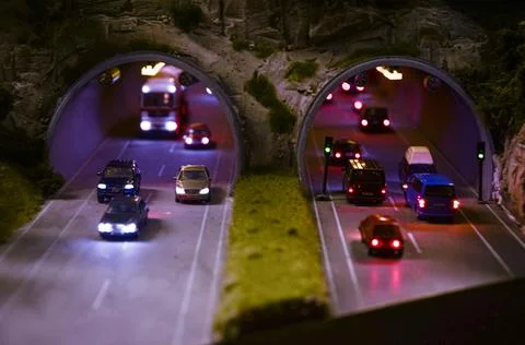 Front view of car traffic on mountain tunnel Stock-Fotos