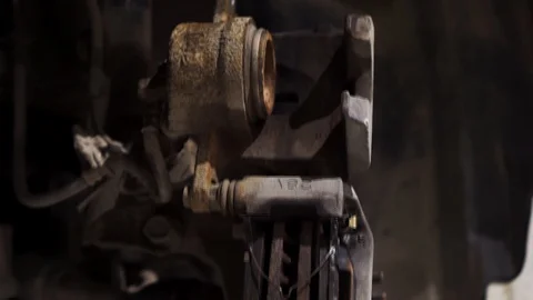 Front view car wheel brake shoes of at repair service station. Footage. 動画素材 128199777