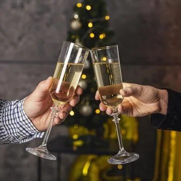 Front view champagne glass cheer Stock Photos