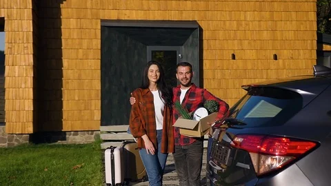 Front view of cheerful good-looking 35s man and woman which posing on camera Stock Footage 121660841