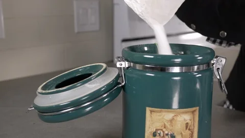 Front view-chef pouring sugar  in a green jar 4k Stock Footage 96137614