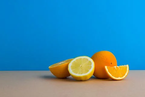 A front view of citrus in blue background 스톡 사진