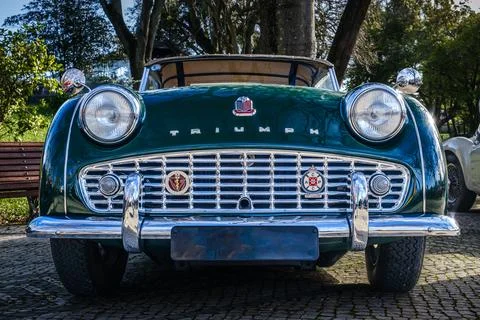 Front view of classic Triumph TR3A sports car on cobblestone road Stock Photos