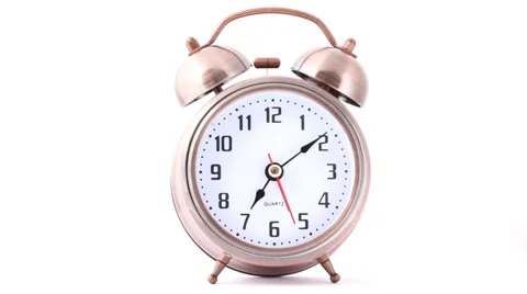 Front view of classical metal alarm clock Stock Footage