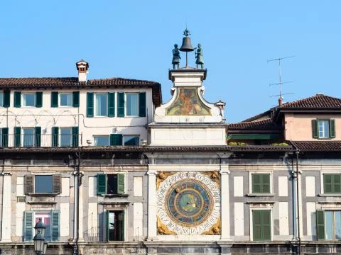 Front view of Clock Tower in Brescia city Stock Photos