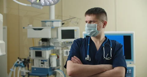 Front view close up of a Caucasian surgeon male healthcare worker in a hospital Stock Footage 151424610