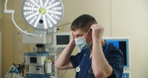 Front view close up of a Caucasian surgeon male healthcare worker in a hospital Stock Footage 151424665