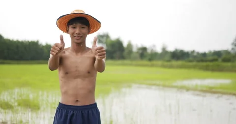 Front view, close up slow motion shot of male farmer, Portrait Young adult  Stock Footage 202053495