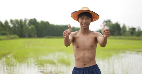 Front view, close up slow motion shot of male farmer Stock Footage 202053895