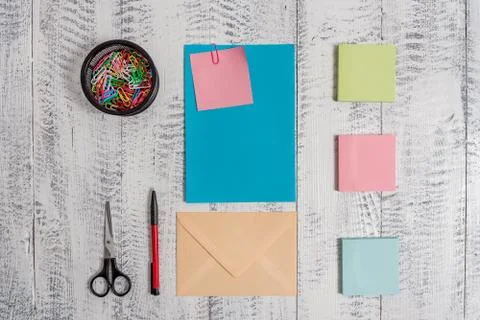 Front view closed colored rectangular envelope blank sheet paper sticky note 스톡 사진