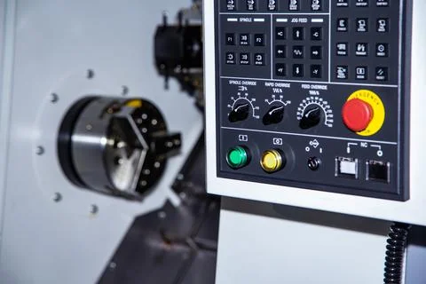 Front view of cnc machine, control panel and working area of lathe Stock Photos