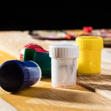 Front view of colored paint cups Photo Stock-Fotos