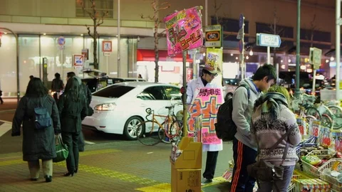Front view of a comic store in Japan, colorful at night. Stock Footage 104668887