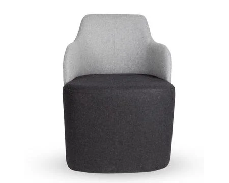 Front view of a contemporary grey upholstered armchair with soft seat isolated Stock Photos