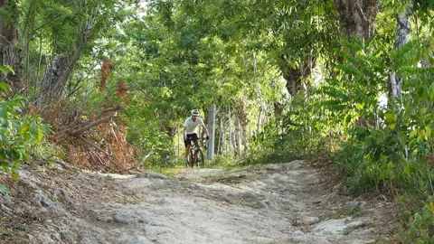 Front view of The cyclist is riding on mountain bike. Stock Footage 131465813
