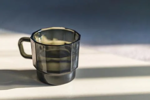 Front View Dark Glass Mug in Natural Light Stock Photos