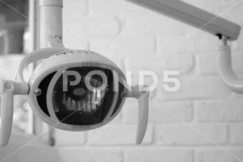 FRONT VIEW OF DENTAL SURGICAL LIGHT Stock Photos