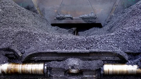 Front view detail of aggregate warm mix asphalt charged on a paving machine 스톡 동영상 253230645