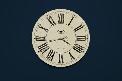 Front view of the dial of a vintage wall clock. Antique imitation. Monogram.. Stock Photos
