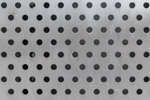 Front view of dot pattern surface in gray colour on steel surface Foto stock