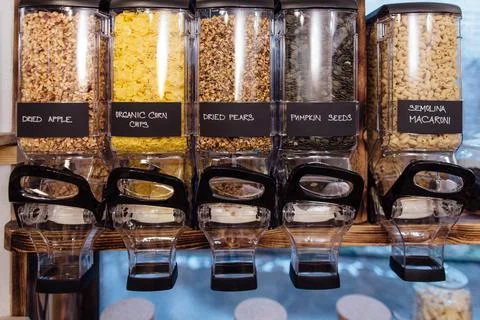 Front view of dried fruit and seeds displayed in grocery store. Stock Photos