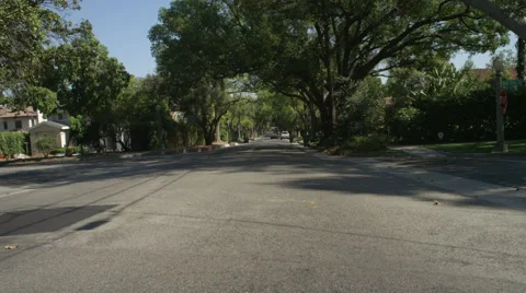Front view of a Driving Plate: Car turns left from South Oak Knoll Avenue in Stock Footage 59334141