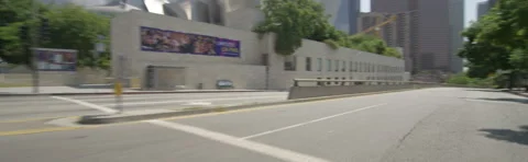 Front view of a Driving Plate: Car travels on Flower Street in Los Angeles, Stock Footage 59340898