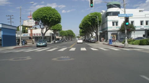 Front view of a Driving Plate: Car travels on Main Street in Santa Monica, Stock Footage 59458162