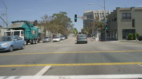 Front view of a Driving Plate: Car traveling on Pico Boulevard in Santa Monica, Stock Footage 59460856