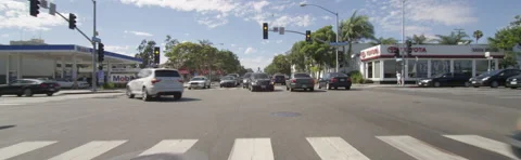 Front view of a Driving Plate: Car traveling on Lincoln Boulevard turns left Stock Footage 59502665