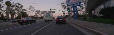 Front view of a Driving Plate: Car travels on Lincoln Boulevard in Santa Monica, Stock Footage 59507855