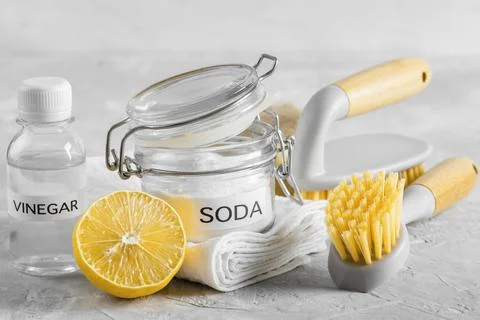 Front view eco friendly cleaning brushes lemon baking soda Stock Photos