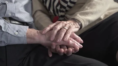 Front view of elderly couple holding hands.Closeup of elderly couple hand . Stock Footage 151825492